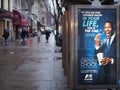 Manhattan, New York, NY, USA - An outdoor billboard at a bus stop. Ordinary scene of the street in the Upper West Side area. Royalty Free Stock Photo