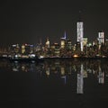 Manhattan at night, New York City skyline with reflection Royalty Free Stock Photo