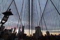 Manhattan panorama view through brooklyn bridge cables