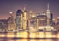 Manhattan skyline at night, color toning applied, New York City, USA Royalty Free Stock Photo