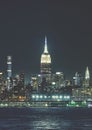 Manhattan skyline at night, color toning applied, New York City, USA Royalty Free Stock Photo