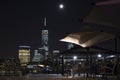 Manhattan skyline at night, New York City, Benches under a canopy