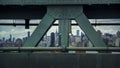 Manhattan Skyline Seen Through a Bridge