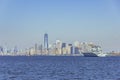 Manhattan skyline with a warship from Staten Island