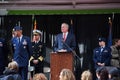 Military Air Force officials standing on podium next to NYC Mayor