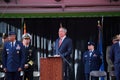 Military Air Force officials standing on podium next to NYC Mayor Bill de Blasio