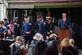 Military Air Force officials standing on podium next to NYC Mayor