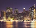 Manhattan waterfront skyline at night, color toning applied, New York City, USA Royalty Free Stock Photo