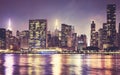 Manhattan waterfront skyline at night, color toning applied, New York City, USA Royalty Free Stock Photo