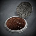 Manhole cover on the asphalt with open lid. 3D illustration Royalty Free Stock Photo