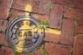 manhole cover belonging to Baltimore Gas and Electric Company