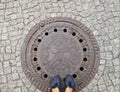 Manhole cover and cobbled square in Berlin