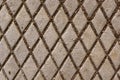 Manhole cover with diamond pattern Royalty Free Stock Photo