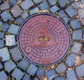 Manhole cover of the gas pipeline system. A massive metal hatch for access to city communications in the pavement