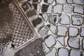 Manhole cover on pavement Royalty Free Stock Photo