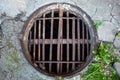 Manhole with the handmade metal armature cover Royalty Free Stock Photo