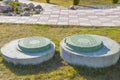 Manhole sewer cleaning system on the ground on a Sunny spring day