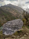 Mani Stones of Buddhism with mantra in Nepal Royalty Free Stock Photo