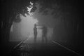 A maniac on a foggy street at night attacks a passerby
