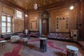 Manial Palace of Prince Mohammed Ali. Guests Hall with wooden ornate ceiling and wooden ornate door, Cairo, Egypt