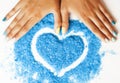 Manicure with blue nails and seasalt close up like Royalty Free Stock Photo