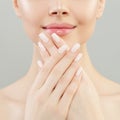 Manicure concept. Woman hands with white nails closeup