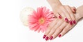 Manicure, delicate flower and candle Royalty Free Stock Photo
