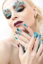 Manicure and makeup with beads and turquoise.