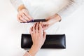 Manicure master nail file work on pointing finger Royalty Free Stock Photo