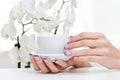 Manicure, orchid and coffee