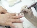 Manicure process on female hand French manicure, Making nail extension