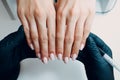 Manicure process female hands finger nails polish Royalty Free Stock Photo