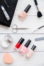 Manicure set and nail polish on wooden background Royalty Free Stock Photo