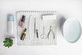 Manicure set in workplace as nail polish, scissors, tweezers, nail file, cream, oil Royalty Free Stock Photo