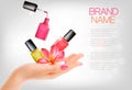 Manicured hands and several nail laquer bottles Royalty Free Stock Photo