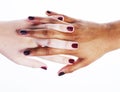 Manicured hands on white isolated, african with caucasian close up, connection diverse people concept