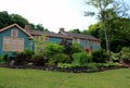 Manicured lawns, landscaped trees and gardens outside gorgeous Bed & Breakfast, Blueberry Brooke, Deansboro, New York, 2019