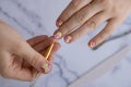 Manicured tools Woman manicured hands, stylish summer colorful nails. Closeup of manicured nails of female hand. Summer Royalty Free Stock Photo