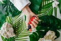 Manicured woman& x27;s nails with red nail polish. Royalty Free Stock Photo