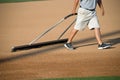 Manicuring the Baseball Field Royalty Free Stock Photo
