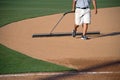 Manicuring the Baseball Field Royalty Free Stock Photo