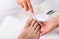 Manicurist Doing Pedicure