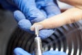 A manicurist makes a girl's nails. Sawing off old nails. Close-up Royalty Free Stock Photo