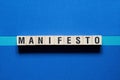 Manifesto word concept on cubes Royalty Free Stock Photo