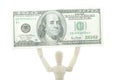 Manikin holds dollar bill high up