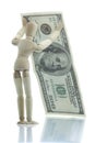 Manikin holds falling dollar bill