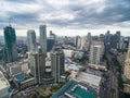 Manila Cityscape, Makati City with Business Buildings and Cloudy Sky. Philippines. Skyscrapers in Background.