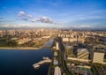 Manila Cityscape in Philippines. Blue Sky and Sunset Light. Pier in Foreground.