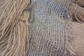 Manila hemp products background: nautical ropes, fishing nets, twine, sacks