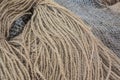 Manila hemp products background: nautical ropes, fishing nets, twine, sacks